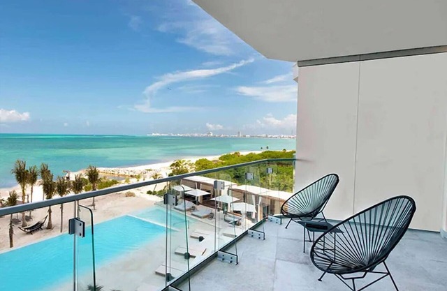 Refreshing Getaway with Scenic Pool and Beach Access | 1 BR Oceanfront Stay