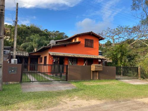Residencial Casa Laranja - Casas na Praia da Ferrugem