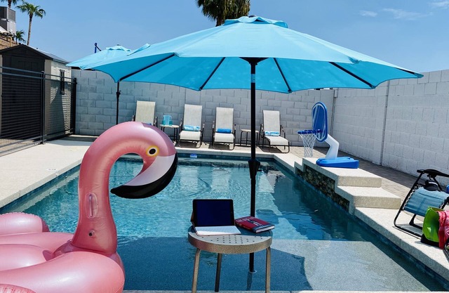 Resort Style Backyard- Heated Pool, Putting Green, Outdoor TV and Pool Table.