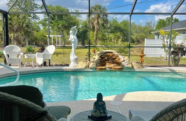 Come and enjoy a relaxing pool oasis close to the beach.