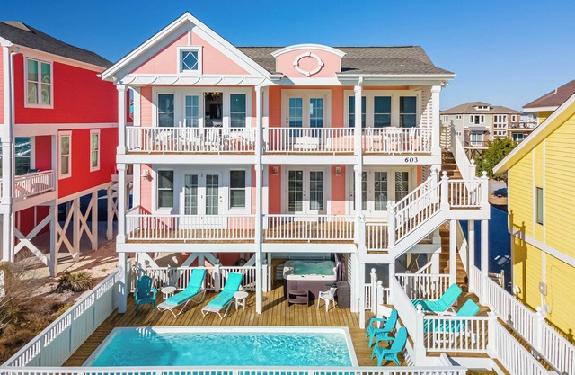 "Salty Pink Flamingo" is a stunning 6-bedroom, 4-bathroom oceanfront retreat with a private pool, hot tub, and elevator.