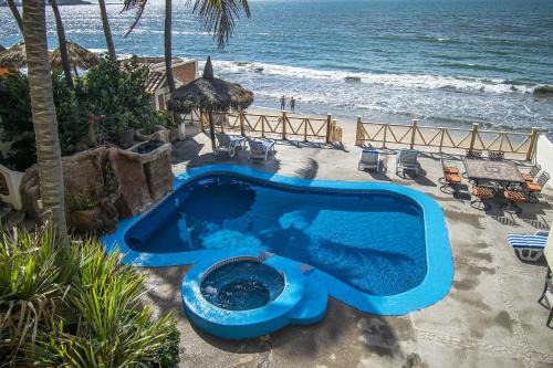 Sandcastle Beachfront Villa With Pool