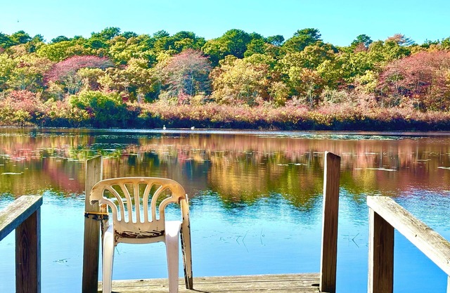 Serene Waterfront Cottage with Private Dock, Walk to Beaches, Golf, Cafe & Shops