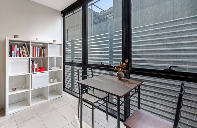 Sleek Inner-City 1-Bed Pad with Pool & BBQ