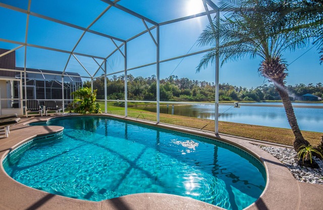ORIENTACIÓN SUR Piscina, vista al lago, 4 baños BR-2, recientemente renovado, a 10 minutos de Disney