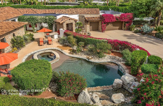 SPECTACULAR 1/2 ACRE GATED ESTATE IN THE HISTORIC MOVIE COLONY!