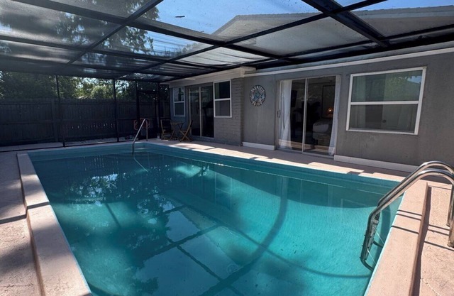 20% Off NEW 4BR Poolside Tampa Gem w/ Private Gym!