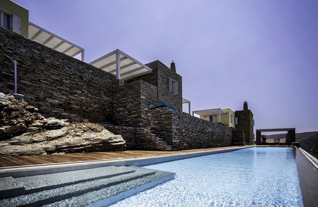 Stone built house with a panoramic sea view & a 25 meters long swimming pool.Hs5