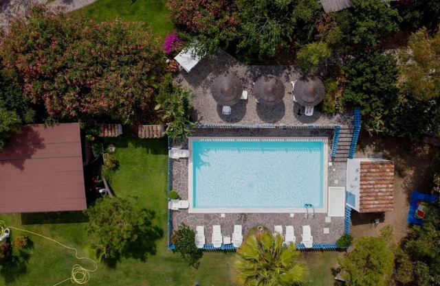 Apartamento estudio 'Agricosta Del Sud Studio2 - 4p' con piscina y jardín compartidos