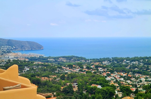 Stylish House in Moraira with Stunning Sea Views and communal pool.