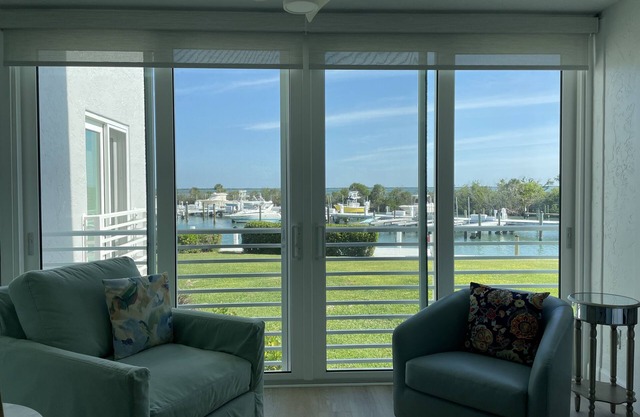 Boca Grande Waterfront Condo overlooking Marina & Stunning Sunrises~Pool, WiFi