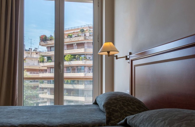 Magnífico apartamento con servicio para 2 en el corazón de Atenas con vista