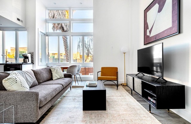 Swanky SoMa 1BR w/ Office, W/D, Private Patio, walk to HQs, by Blueground