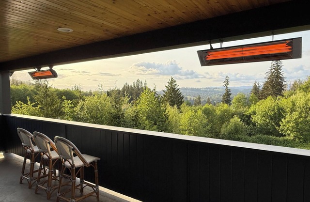 sweeping views, open living, large heated covered deck, marina community w/ slip
