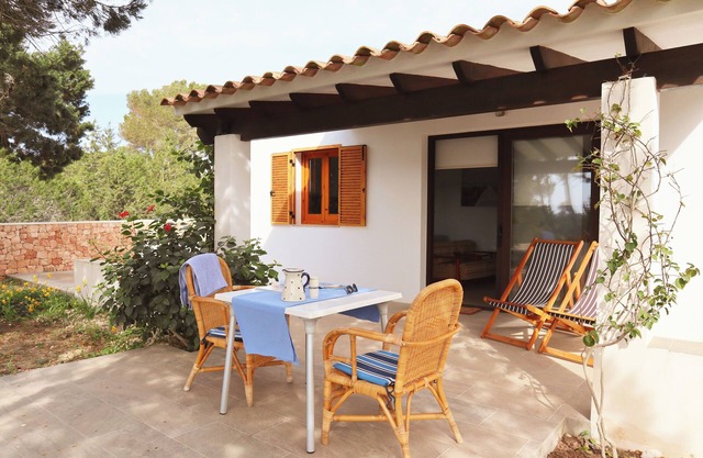Casa con terraza y jardín ideal familias. Acceso caminando a la Playa (300m)