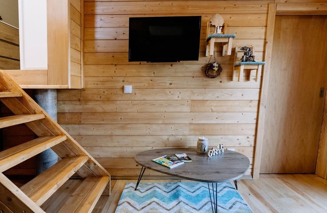 Wooden cabin in complex with pool