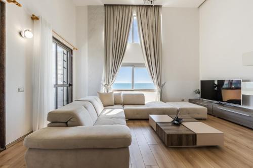 The Grand Seafront Duplex by PS