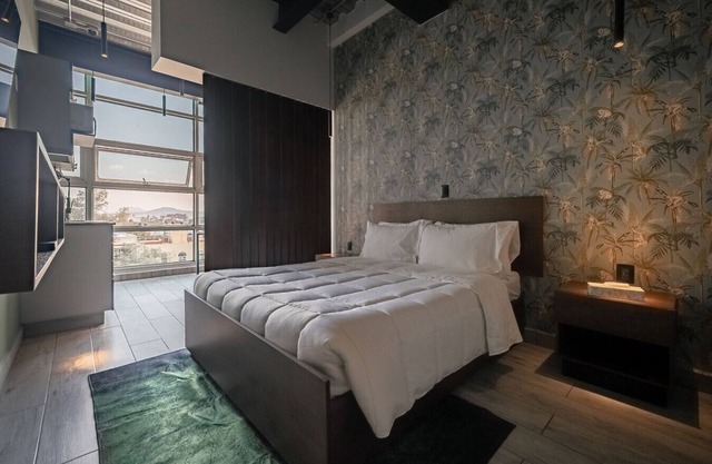 The Jungle Loft 5 – Confort Tropical en Ubicación Céntrica con Cocina