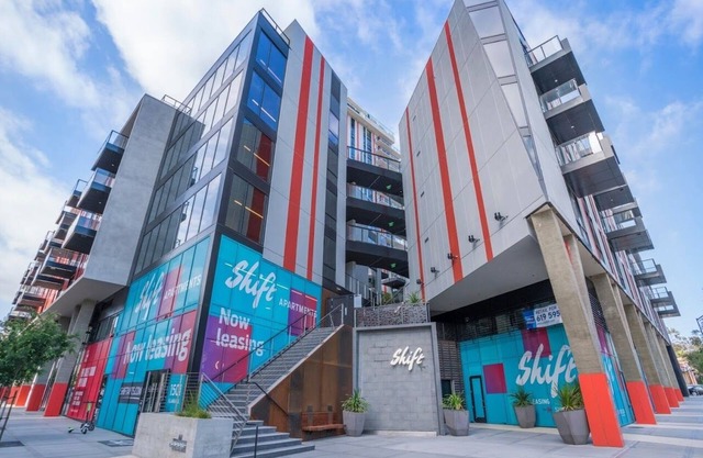 The Shift – Designer 1BRs with rooftop pool, gym, and quartz interiors.