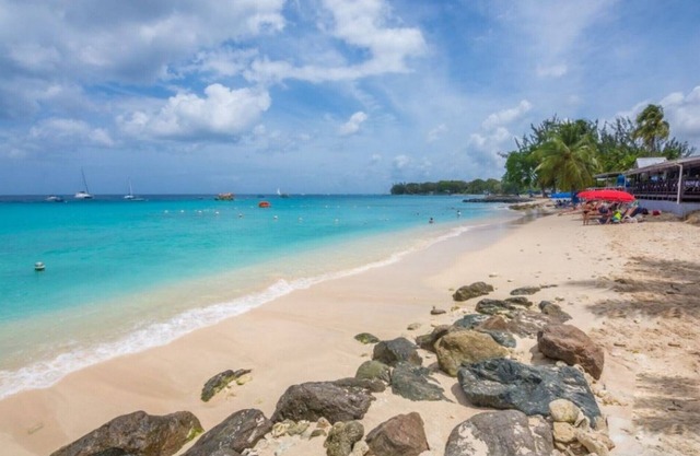 **ENQUIRE FOR BEST RATES** Three Bedroom Beach front apartment in Holetown with super seaviews