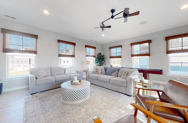 Tidal Walk home with pond views, outdoor pool, decks, fast WiFi, & bikes