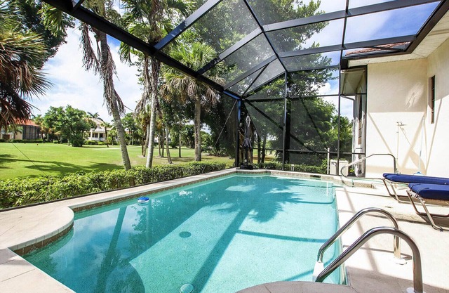 Tin Cup - Beachview Estates home with pool on golf course