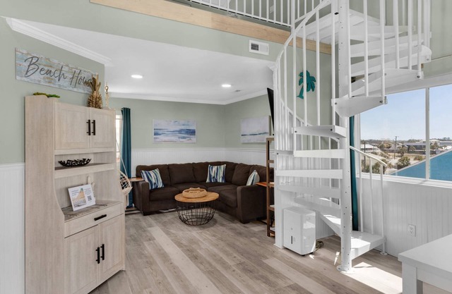 Top-floor getaway w/ balcony, designated parking, and complimentary activities!