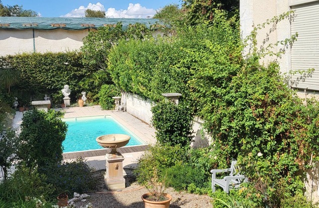 Town House with walled garden and heated pool