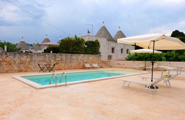 TRULLI "SOLE" INMERSO EN EL CORAZÓN DEL VALLE D'ITRIA