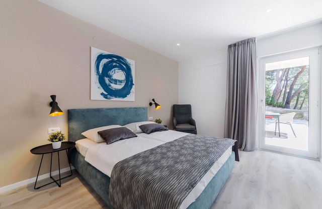 Apartamento para dos personas con una terraza Rabac, Labin (A-9652-b)