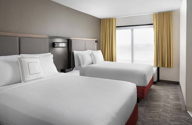 Two Family Ready Rooms w/ Living Area, Pool, and Daily Free Breakfast
