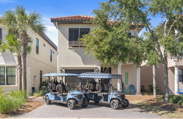 Casa costera con NUEVO CARRO DE GOLF DE 6 ASIENTOS y parrilla de barbacoa
