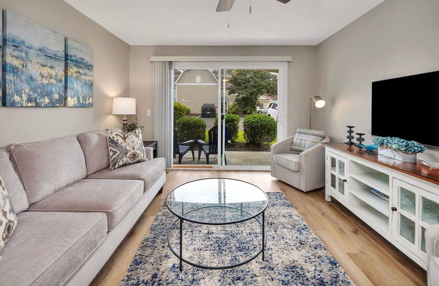Updated first floor condominium with access to heated pool and tennis courts!