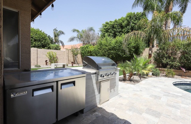 Updated single-level home with an oasis back yard, private pool & washer/dryer