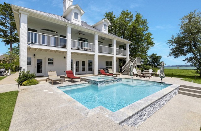 NEW! Upscale Lakefront Oasis – Pool, Hot Tub, Balcony, Game Room & More