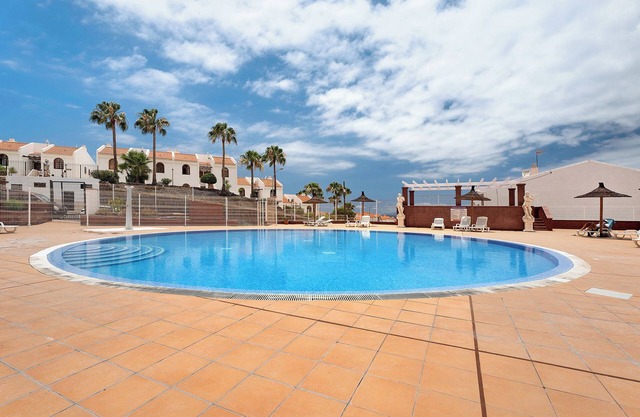 Apartamento de vacaciones 'Torviscas Endless Summer' con vistas al mar, piscina compartida y Wi-Fi