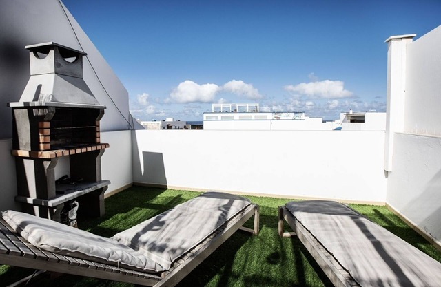 Casa de vacaciones 'Amura House' con jardín privado, balcón y Wi-Fi