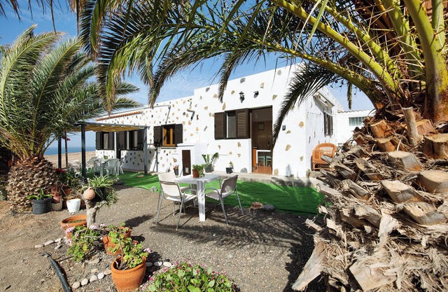 Casa de vacaciones 'Apartamento La Solapa' con vistas a la montaña, jardín compartido y Wi-Fi