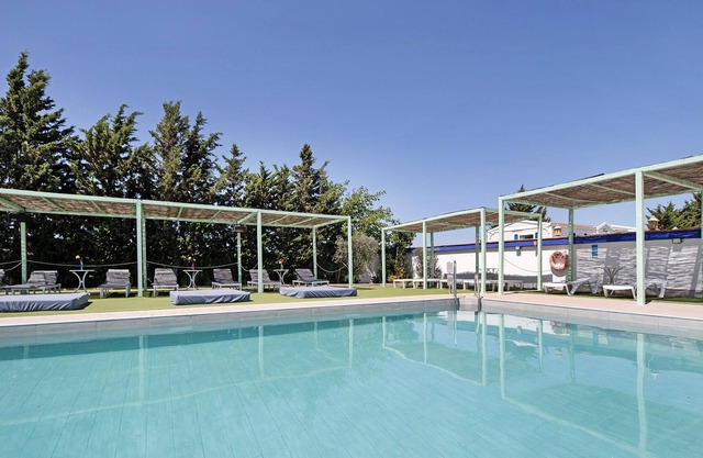 Casa de vacaciones "Bungalow La Villoria Deluxe 5" con piscina compartida, terraza privada y Wi-Fi