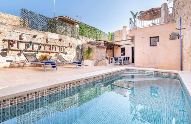Casa de vacaciones "Cas Solleric" con piscina, balcón, aire acondicionado y Wi-Fi
