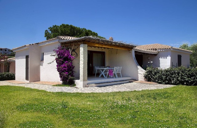 Casa de vacaciones "Casa giardino e spiaggia a piedi" cerca de la playa con jardín y terraza