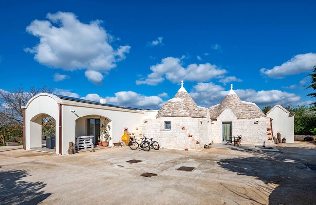 Casa de vacaciones "La Valle dei Trulli" con jardín privado, bañera de hidromasaje y Wi-Fi