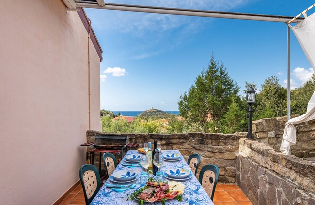 Casa de vacaciones "Villa Leonardo Sud Sardegna" con vistas al mar, terraza privada y Wi-Fi