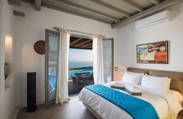 Villa 'Amallini, Luxe Infinity Pool' con vistas al mar, Wi-Fi y aire acondicionado