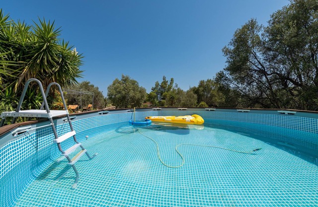 Villa "Casa Vacanze Elena" con jardín, terraza y piscina