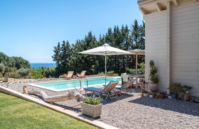 Villa 'Driftwood' con vistas al mar, Wi-Fi y aire acondicionado