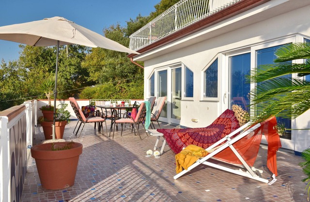5 minutes from the historic village center with a fantastic sea view