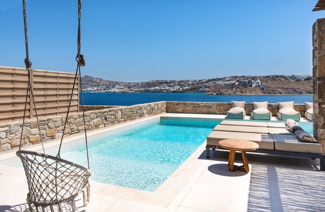Villa 'Myko Seafront' con vistas al mar, Wi-Fi y aire acondicionado