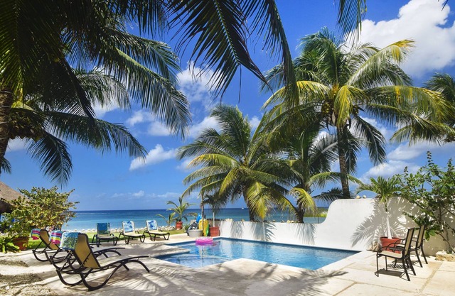 Villa Sol Haa, Villa exclusiva frente a la playa con piscina, aire acondicionado, personal y niños amigables