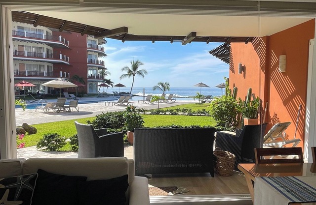 Walk out to pool and ocean steps away.